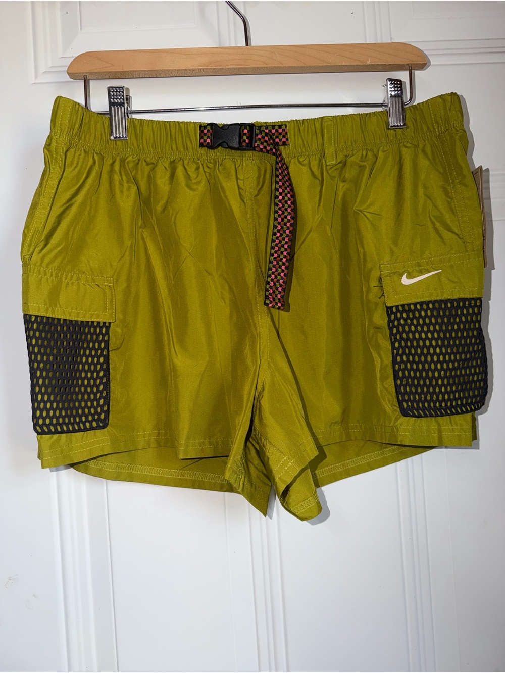 Nike woman’s Olive Green Cargo Shorts with Black Mesh Pockets